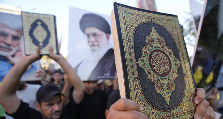 احتجاجا على تدنيس القرآن: احراق العلم السويدي في العراق