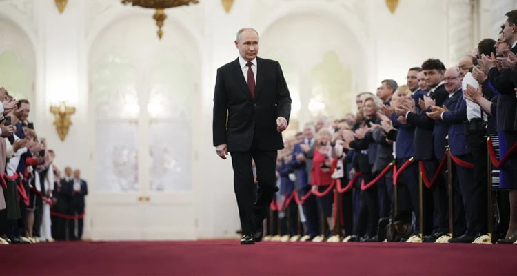 Putin begins his fifth term as president and promises Russians victory