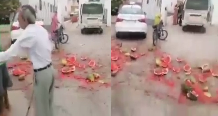 بائع دلاع يلقي بضاعته امام مركز الحرس