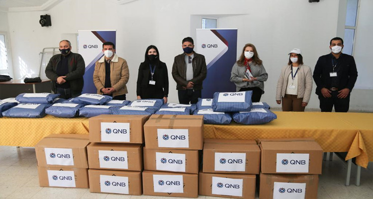 بنك QNB يرافق أطفال تالة من أجل شتاء دافئ 