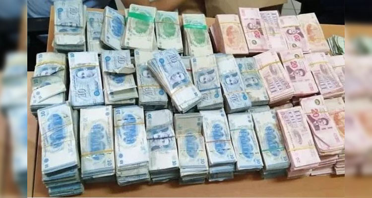 حجز سيارات وساعات وآلاف الدنانير في أعقاب مداهمة لمحلات الرهان الموازي 